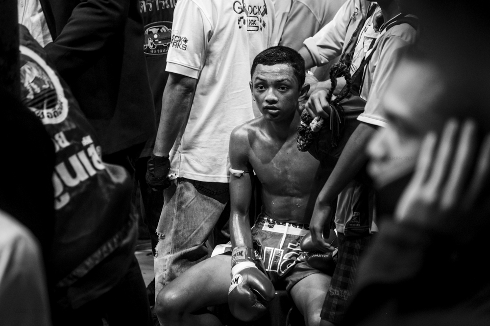 A fighter showing some nerves amongst the crowd before his fight during a Muay Thai fight at Chang 7