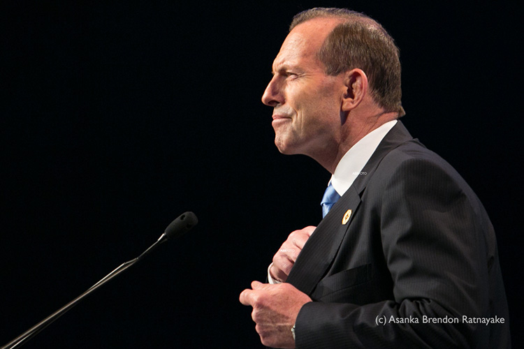 Australian Prime Minster Tony Abbott arrives to speak during his final press conference at the Brisbane Convention and Exhibition Centre in Brisbane at the conclusion of the g20 Leaders Summit.  (c) Asanka Brendon Ratnayake all right reserved